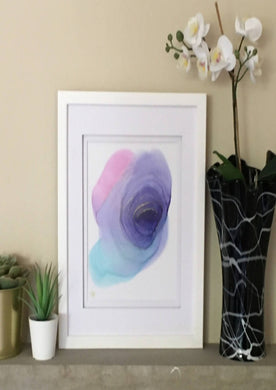 Sweet Pea 1 alcohol ink painting shows an abstract purple, blue and pink spiral that's darker in the middle and fades as it goes further out.